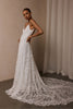 woman wearing a white lace backless dress with thin straps and delicate chain jewellery across her back_XS_