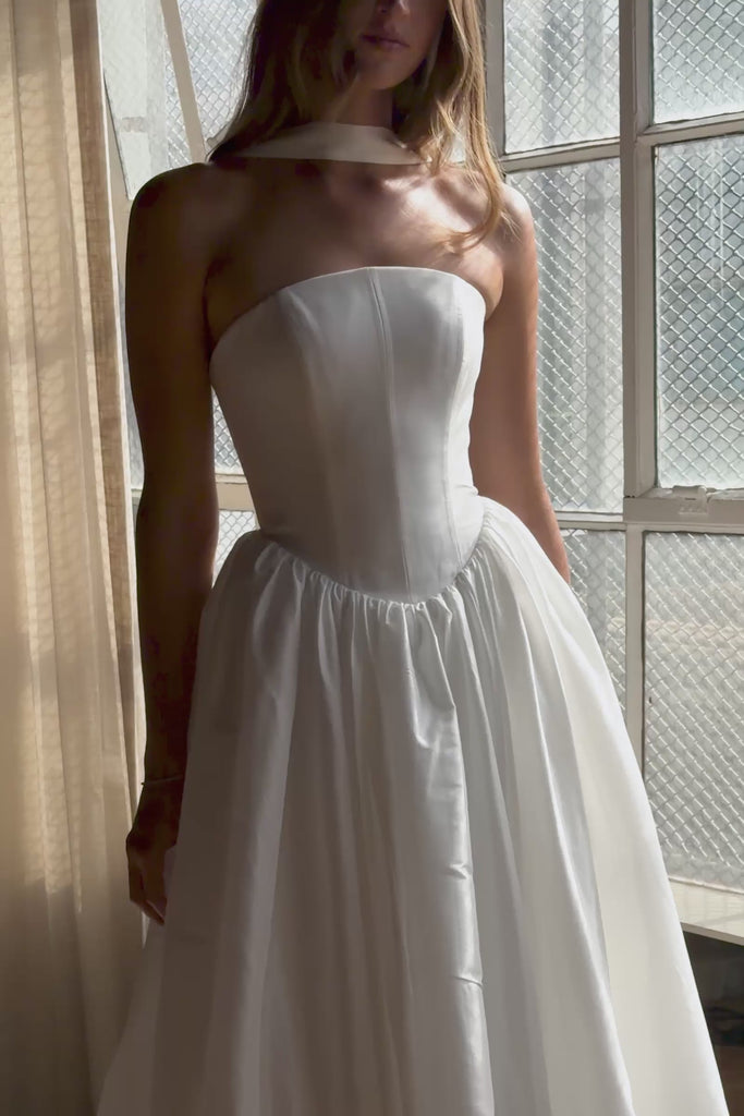 Video of a taffeta wedding gown showing the up close detailing